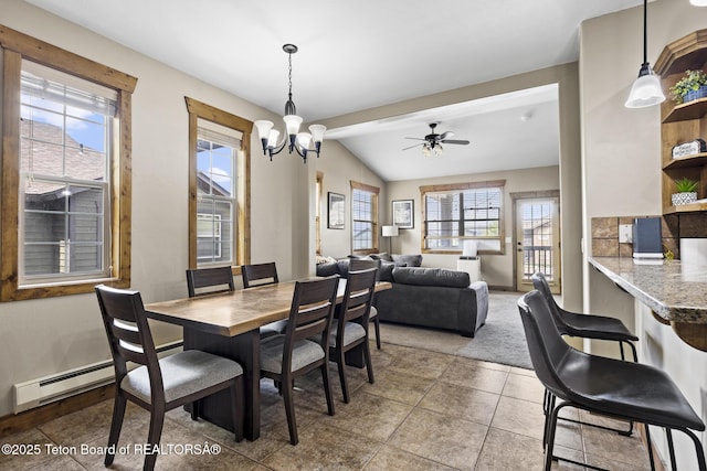 715 Moraine Ct Unit 36, Driggs, ID 83422 - tiled dining space with baseboard heating, a chandelier, lofted ceiling, and ceiling fan