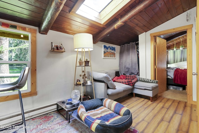 4075 Jarvis Ln, Wilson, WY 83014 - living area featuring a skylight, wood finished floors, and wooden ceiling