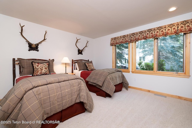 3065 N Mountain Maple Ln, Wilson, WY 83014 - carpeted bedroom featuring baseboards and recessed lighting