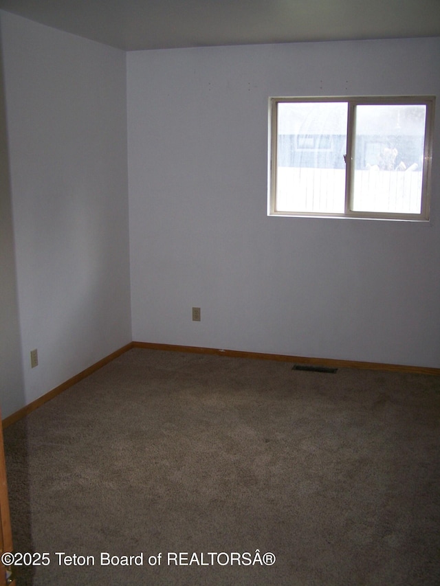 6 Opal St, Pinedale, WY 82941 - unfurnished room with carpet floors and baseboards