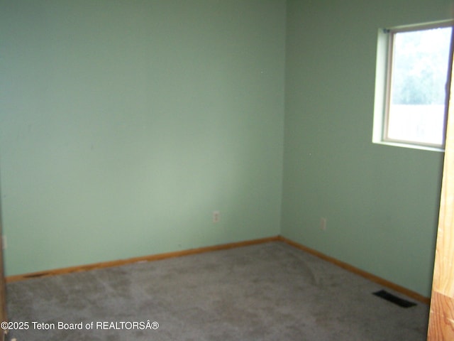 6 Opal St, Pinedale, WY 82941 - spare room featuring carpet