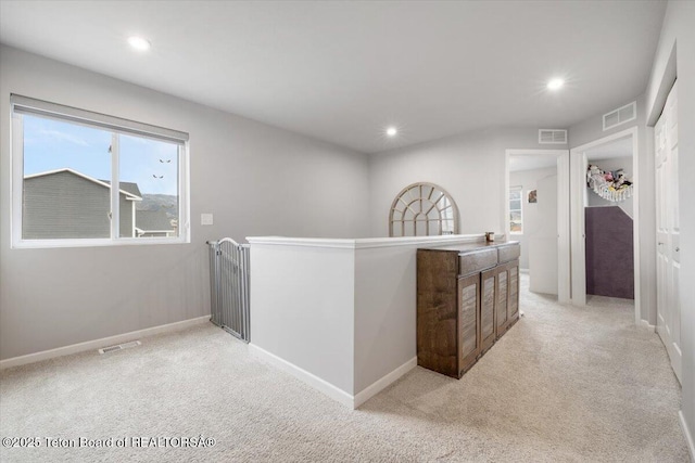 365 Little Greys Lp, Etna, WY 83118 - hallway featuring an upstairs landing, light colored carpet, and recessed lighting