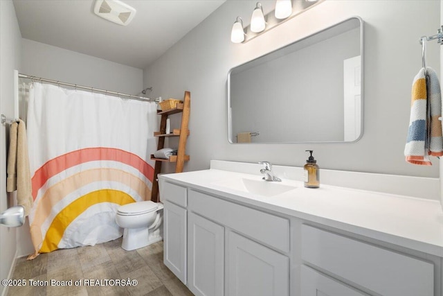 365 Little Greys Lp, Etna, WY 83118 - bathroom featuring vanity and a shower with shower curtain