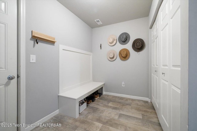 365 Little Greys Lp, Etna, WY 83118 - mudroom featuring wood finished floors and baseboards