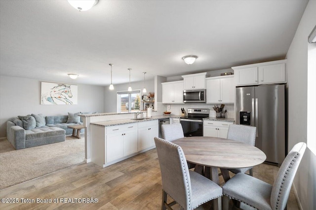 365 Little Greys Lp, Etna, WY 83118 - dining room with light wood finished floors