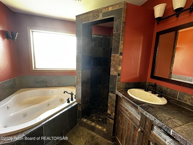 21 Hawk Path, Boulder, WY 82923 - full bathroom featuring a whirlpool tub, tiled shower, and vanity
