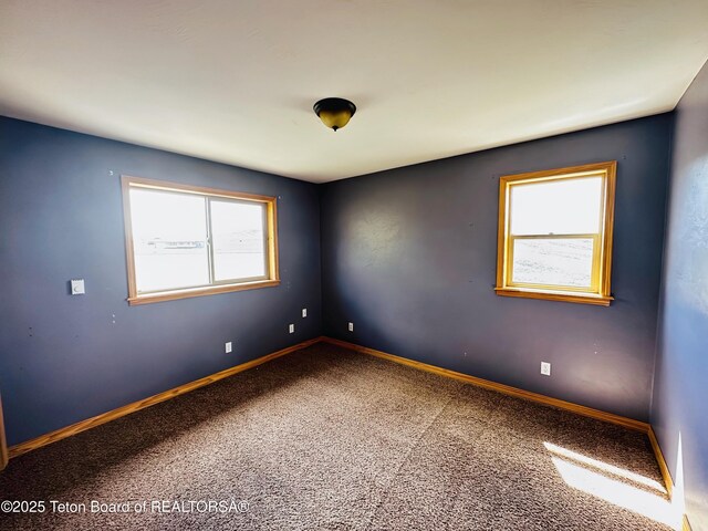 21 Hawk Path, Boulder, WY 82923 - carpeted empty room featuring plenty of natural light and baseboards