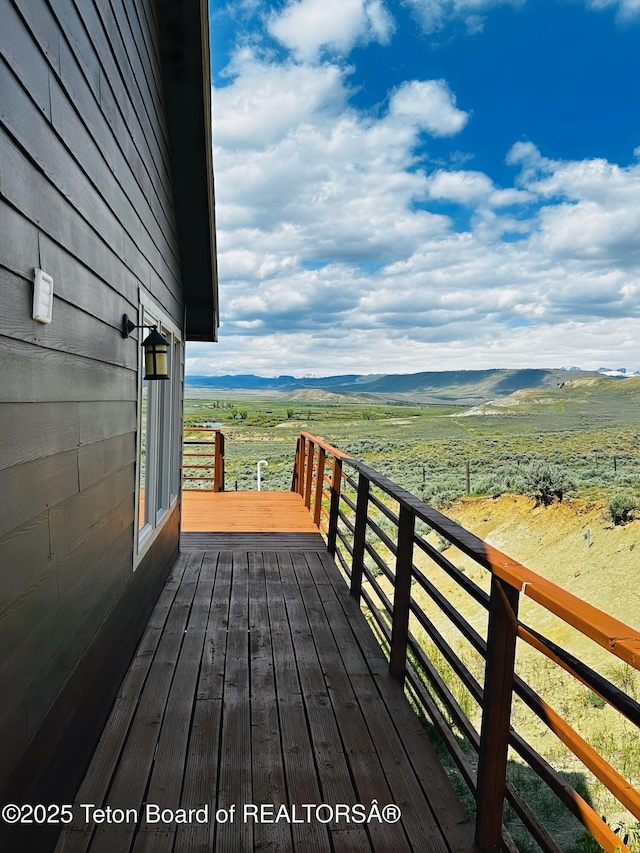 21 Hawk Path, Boulder, WY 82923 - wooden terrace featuring a mountain view and a rural view