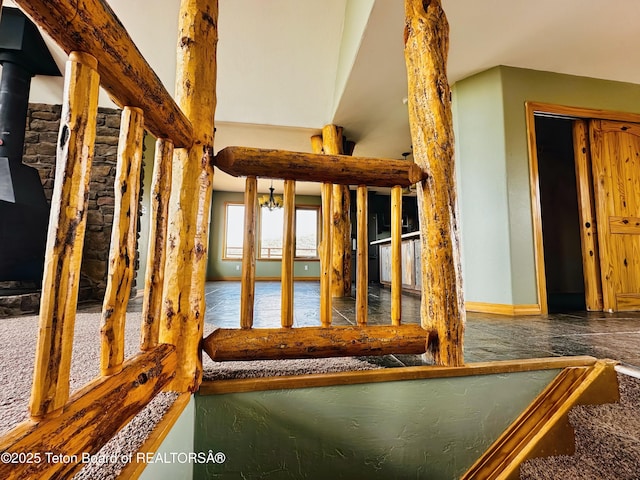 21 Hawk Path, Boulder, WY 82923 - detailed view of a wood stove and baseboards