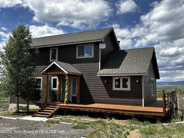 21 Hawk Path, Boulder, WY 82923 - view of front of home with roof with shingles and a wooden deck