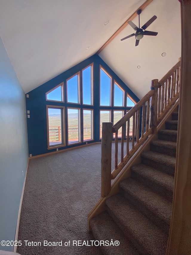 21 Hawk Path, Boulder, WY 82923 - stairway featuring lofted ceiling, a ceiling fan, baseboards, plenty of natural light, and carpet flooring