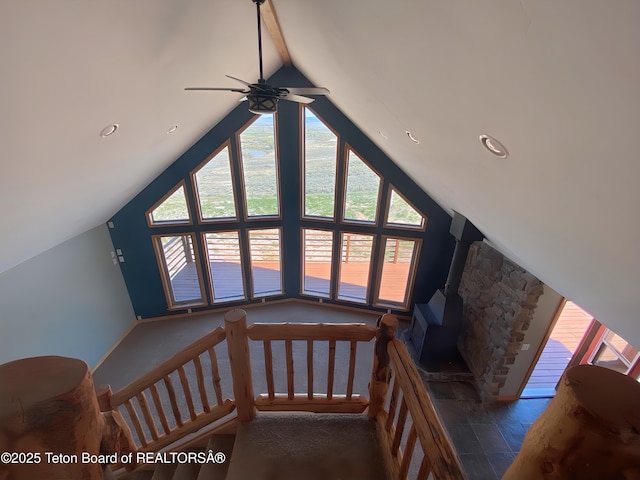 21 Hawk Path, Boulder, WY 82923 - stairs featuring a ceiling fan, lofted ceiling, and a wood stove