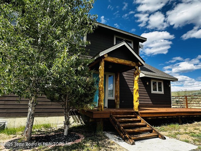 21 Hawk Path, Boulder, WY 82923 - view of front facade featuring a wooden deck