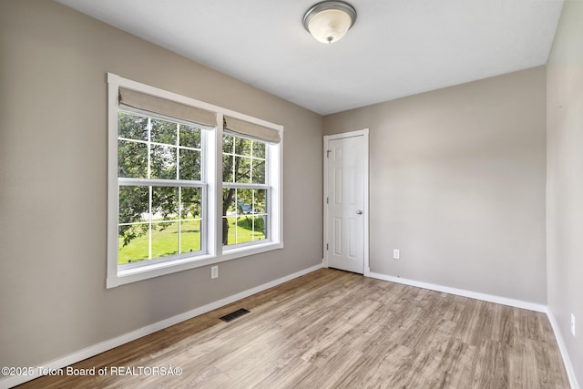 560 Appaloosa Trl, Driggs, ID 83422 - unfurnished room featuring wood finished floors and baseboards