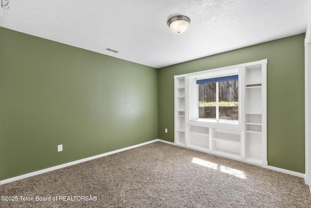 560 Appaloosa Trl, Driggs, ID 83422 - carpeted spare room featuring baseboards