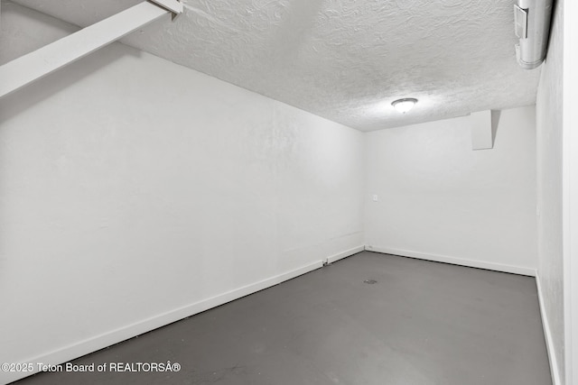 560 Appaloosa Trl, Driggs, ID 83422 - finished basement featuring a textured ceiling and baseboards
