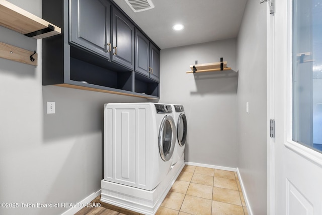 560 Appaloosa Trl, Driggs, ID 83422 - laundry room with separate washer and dryer, baseboards, recessed lighting, and light tile patterned floors