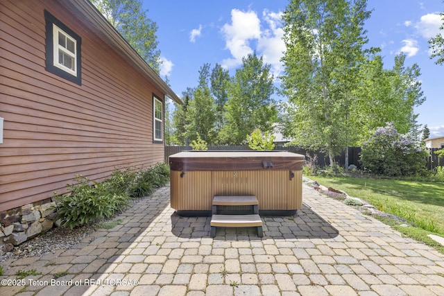 560 Appaloosa Trl, Driggs, ID 83422 - view of patio / terrace with a hot tub