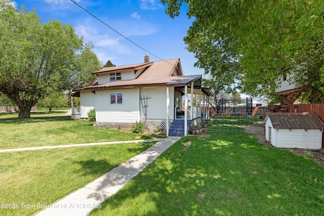 105 Heap Dr, Thayne, WY 83127 - view of side of home featuring a chimney and metal roof