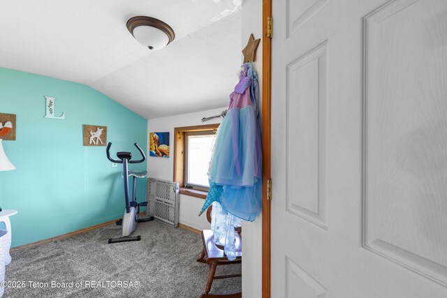 105 Heap Dr, Thayne, WY 83127 - exercise area featuring lofted ceiling, carpet flooring, and baseboards