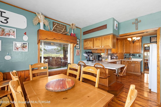 105 Heap Dr, Thayne, WY 83127 - dining space with light wood finished floors and a chandelier