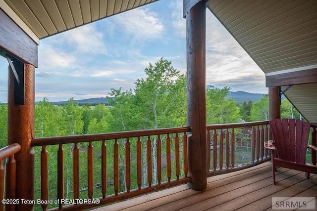 4770 Deer Dr, Island Park, ID 83429 - deck featuring a mountain view