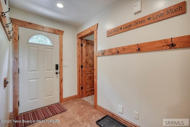 4770 Deer Dr, Island Park, ID 83429 - entrance foyer with recessed lighting, light tile patterned floors, and baseboards