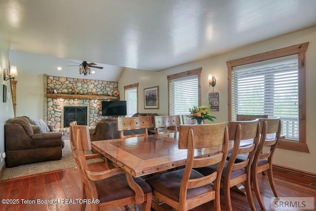 4770 Deer Dr, Island Park, ID 83429 - dining area featuring wood finished floors, ceiling fan, baseboards, and vaulted ceiling
