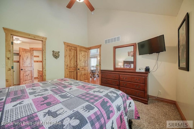 4770 Deer Dr, Island Park, ID 83429 - bedroom with high vaulted ceiling, carpet, baseboards, and a ceiling fan
