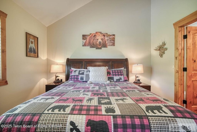 4770 Deer Dr, Island Park, ID 83429 - bedroom featuring lofted ceiling