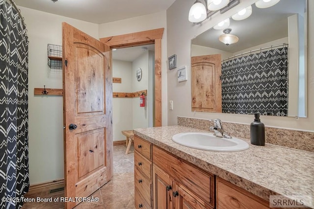 4770 Deer Dr, Island Park, ID 83429 - bathroom with vanity and tile patterned floors
