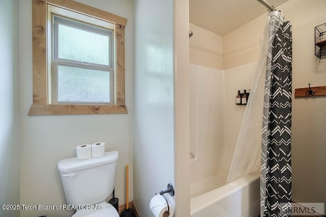 4770 Deer Dr, Island Park, ID 83429 - full bathroom with toilet and shower / bath combo with shower curtain