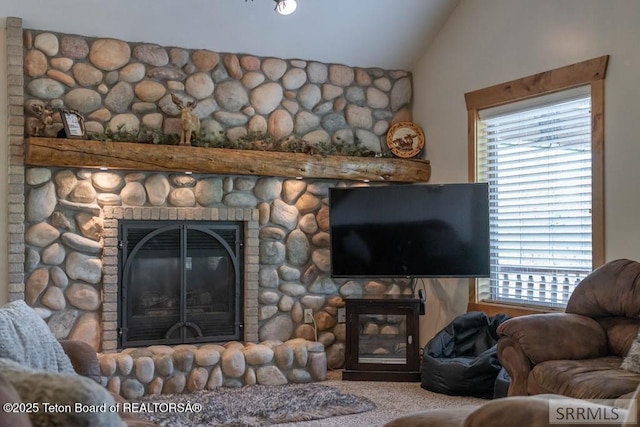 4770 Deer Dr, Island Park, ID 83429 - living area with a fireplace, lofted ceiling, and plenty of natural light