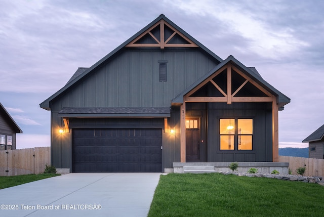 311 Bald Eagle Dr, Victor, ID 83455 - view of front facade featuring board and batten siding and driveway