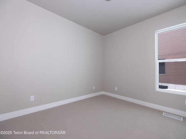 311 Bald Eagle Dr, Victor, ID 83455 - carpeted empty room with baseboards