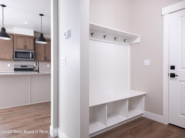 311 Bald Eagle Dr, Victor, ID 83455 - mudroom featuring wood finished floors, baseboards, and recessed lighting