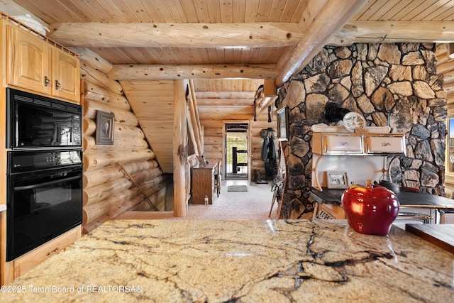196 Soda Springs Dr, Dubois, WY 82513 - kitchen with black appliances, rustic walls, a wooden ceiling with exposed beams, light stone counters, and carpet floors