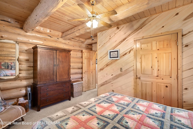 196 Soda Springs Dr, Dubois, WY 82513 - bedroom featuring a wood ceiling with exposed beams, light carpet, and log walls