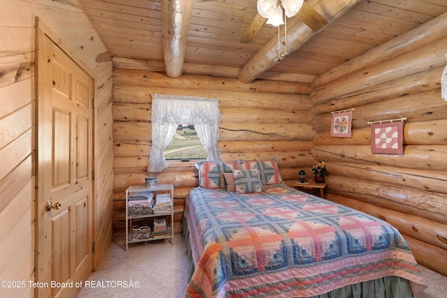 196 Soda Springs Dr, Dubois, WY 82513 - carpeted bedroom featuring a wooden ceiling with exposed beams