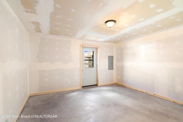 196 Soda Springs Dr, Dubois, WY 82513 - unfurnished room featuring electric panel and concrete flooring