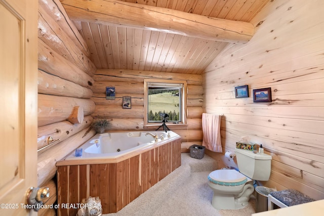 196 Soda Springs Dr, Dubois, WY 82513 - bathroom featuring a whirlpool tub, wood ceiling, and rustic walls