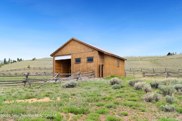 196 Soda Springs Dr, Dubois, WY 82513 - view of outdoor structure featuring a view of countryside and an exterior structure