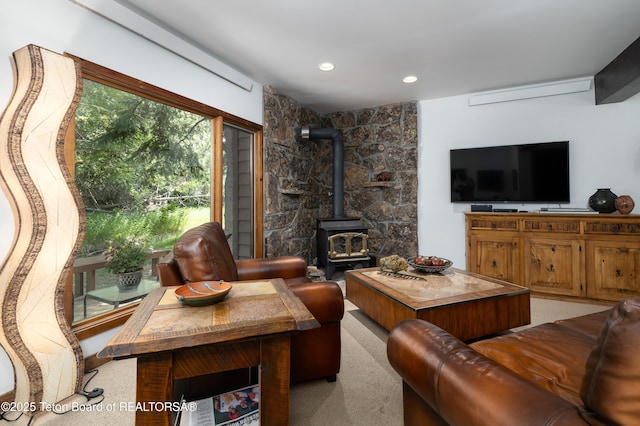 450 E Sagebrush Dr Unit 3-1-A, Jackson, WY 83001 - living area featuring a wood stove and recessed lighting