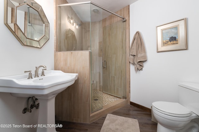 450 E Sagebrush Dr Unit 3-1-A, Jackson, WY 83001 - full bathroom with a stall shower and wood finished floors