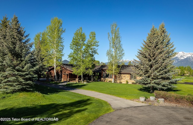 720 E Paintbrush Dr, Jackson, WY 83001 - surrounding community with a yard