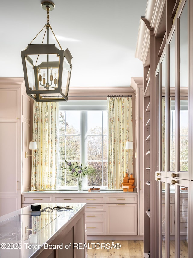 5025 Shoshone Dr, Wilson, WY 83014 - kitchen with a chandelier and pendant lighting