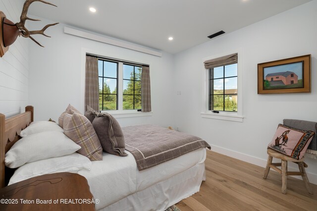 5025 Shoshone Dr, Wilson, WY 83014 - bedroom featuring wood finished floors and recessed lighting