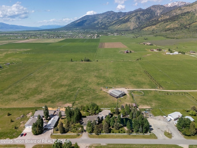 1255 Lost Crk, Thayne, WY 83127 - aerial view of property's location with rural landscape and a mountainous background