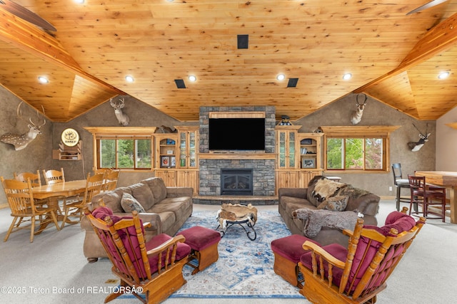 1255 Lost Crk, Thayne, WY 83127 - carpeted living room with vaulted ceiling, wood ceiling, healthy amount of natural light, a fireplace, and recessed lighting