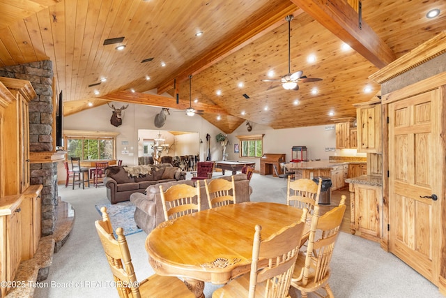 1255 Lost Crk, Thayne, WY 83127 - dining space featuring light colored carpet, a ceiling fan, plenty of natural light, recessed lighting, and wooden ceiling